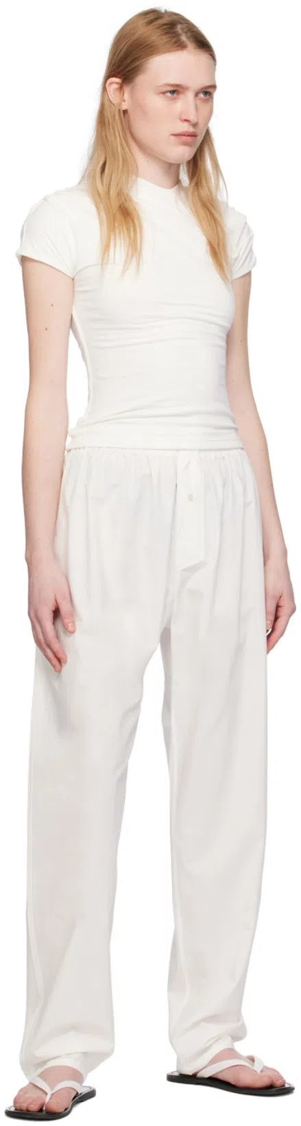 THE ROW Round Head Flat-bottom Flip Flops In Black