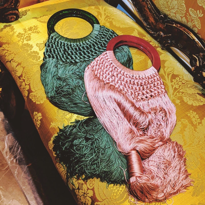 Selfridges's Posts | Wearing: Cult Gaia Angelou Tasselled Crochet And Resin Clutch In Mauve; Cult Gaia Malachite Green Tasselled Angelou Crochet And Resin Clutch Bag
