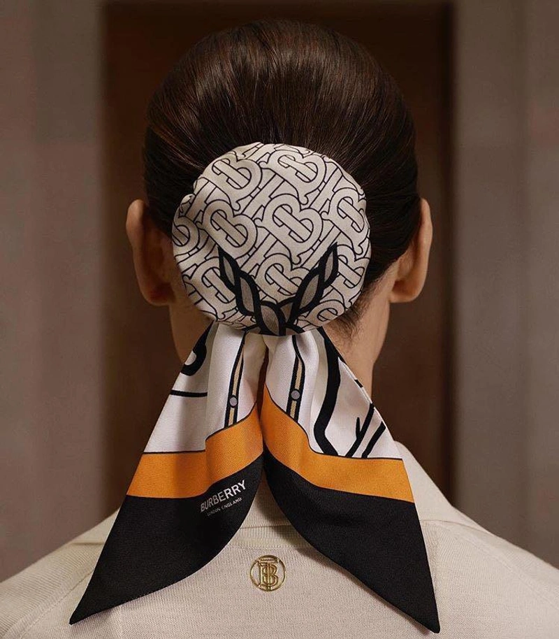 ShopBAZAAR's Post | Wearing: Burberry Monogram Print Silk Hair Scarf In Brown