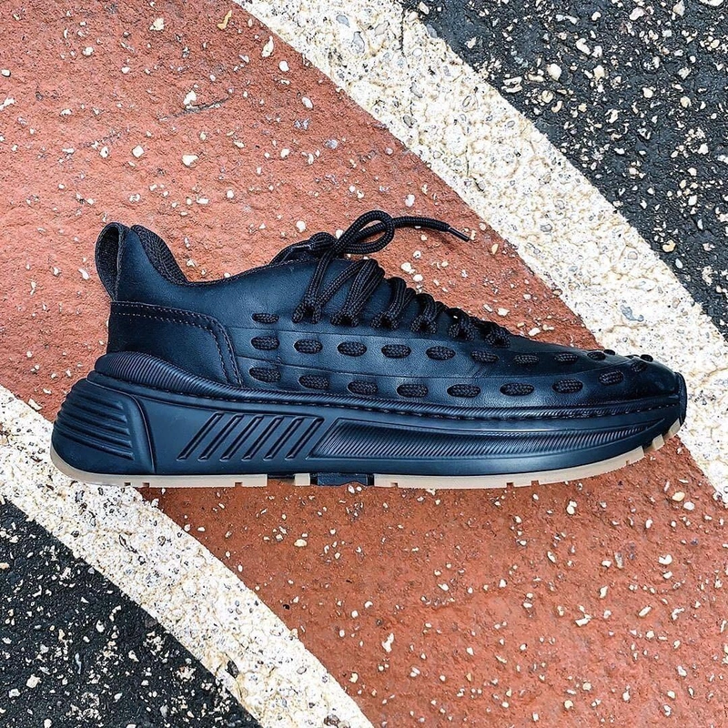 THELIST's Post | Wearing: Bottega Veneta Speedster Low-top Sneakers In Black; Bottega Veneta White Mesh Speedster Sneakers; Bottega Veneta Contrast Lace Sneakers In White / Red