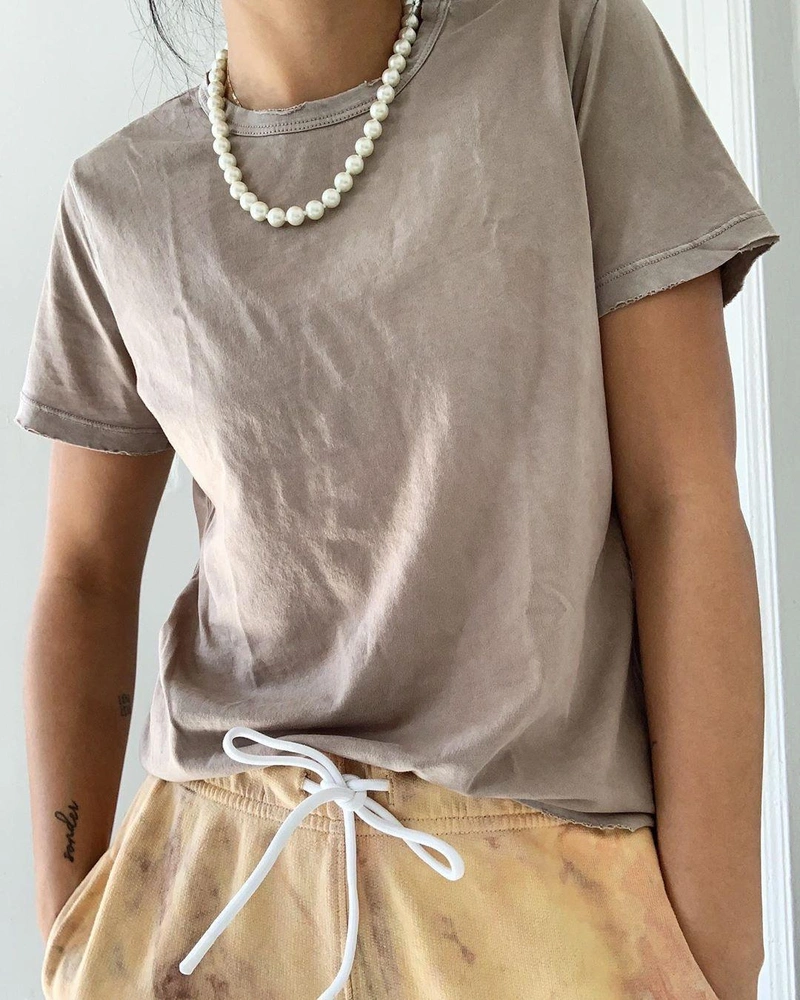 shopbop.com's Posts | Wearing: Cotton Citizen Standard Tee In Vintage Sand Dollar; Kenneth Jay Lane Glass Pearl Strand Necklace