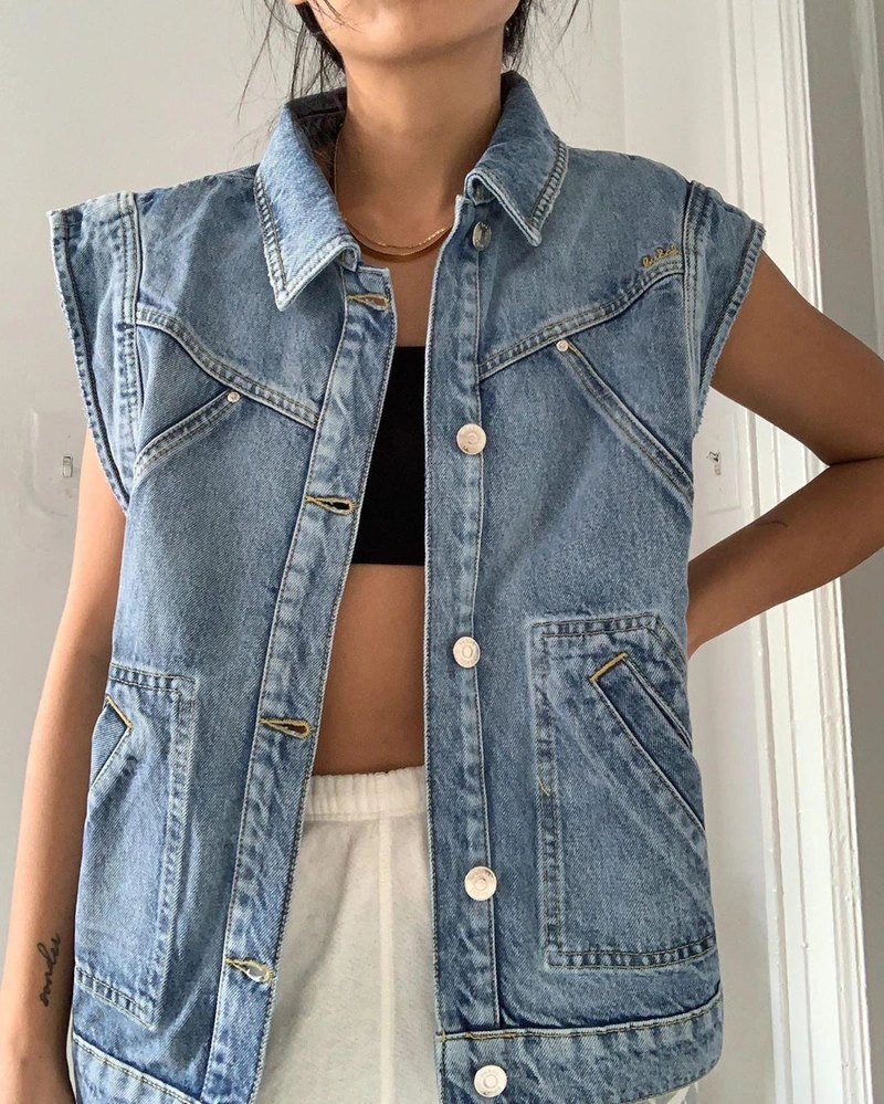 shopbop.com's Posts | Wearing: Ba&sh Heaster Jacket In Light Used Blue; Only Hearts Feather Weight Rib Athletic Bralette In Black; Shashi Khaleesi Necklace In Gold