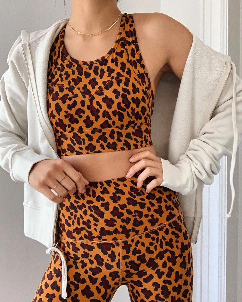shopbop.com's Posts | Wearing: Varley Basset Cheetah-print Sports Bra In Brown; Varley Century Cheetah-print Leggings In Yellow